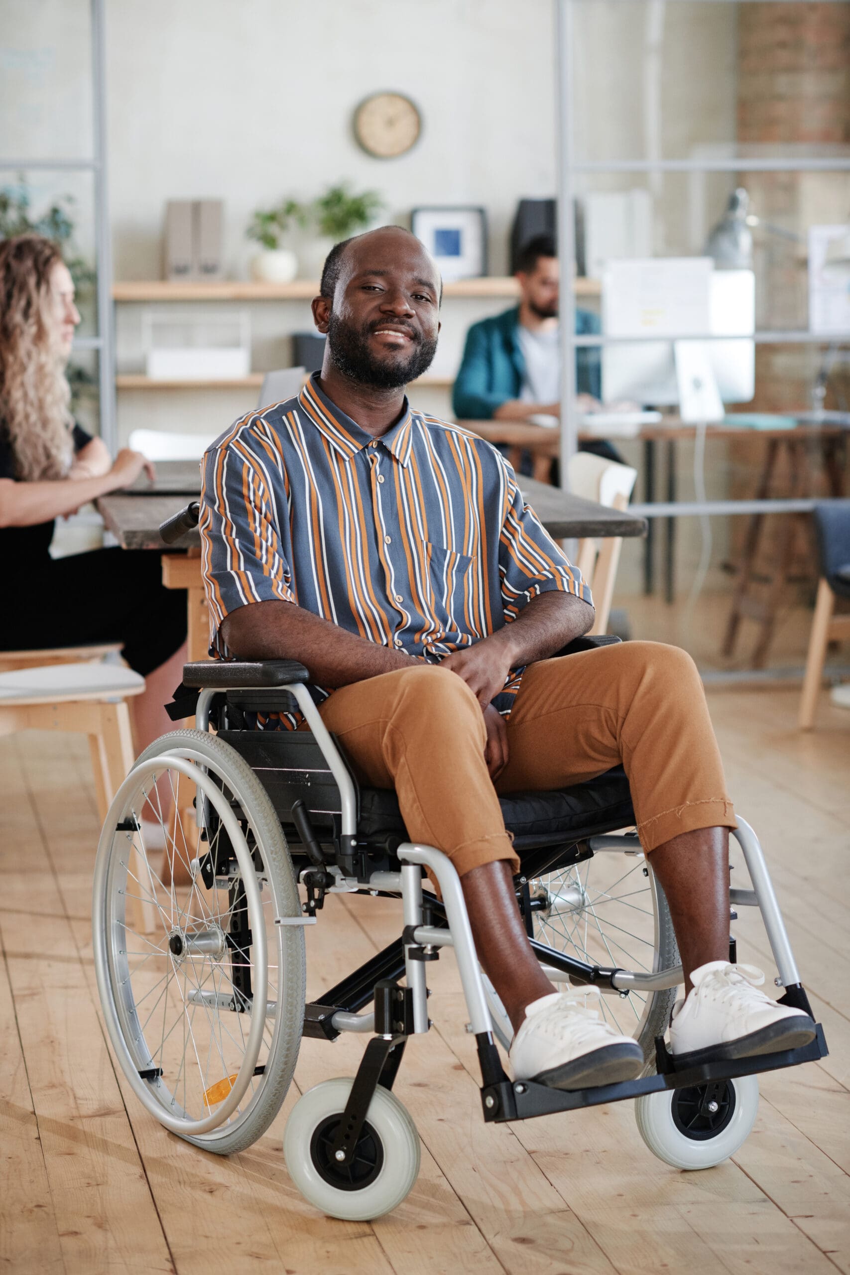 Disabled businessman sitting in wheelchair